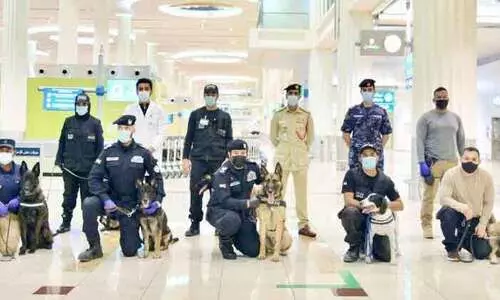 കോ​വി​ഡ്​ ബാ​ധി​ത​രെ മ​ണ​ത്ത​റി​യാ​ൻ പൊ​ലീ​സ്​ നാ​യ്​​ക്ക​ൾ