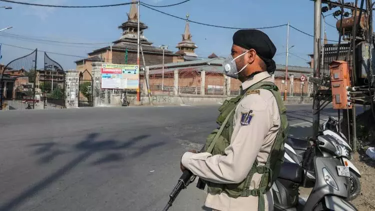 kashmir policeman standing
