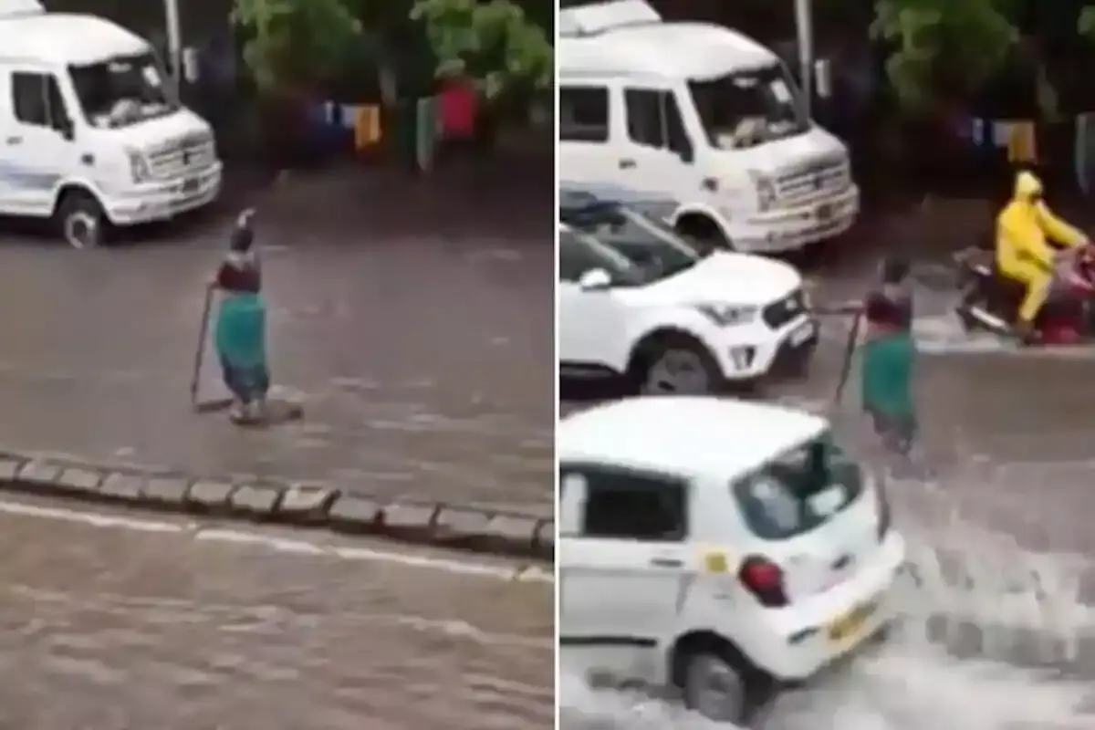 മാൻഹോളിൽ വാഹനം വീഴാതിരിക്കാൻ 54കാരി  റോഡിൽ നിന്നത്​ ഏഴ്​ മണിക്കൂർ; കയ്യടിച്ച്​ ലോകം