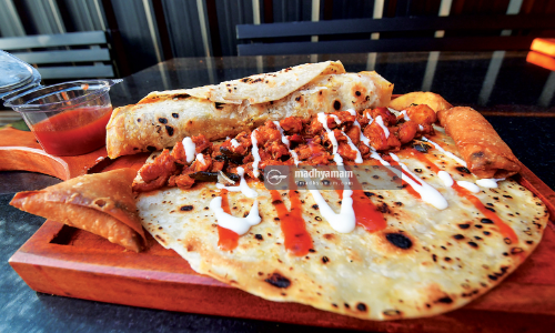 ടൈ​​ഗ​​ർ ചി​​ക്ക​​ൻ  റോ​ൾ