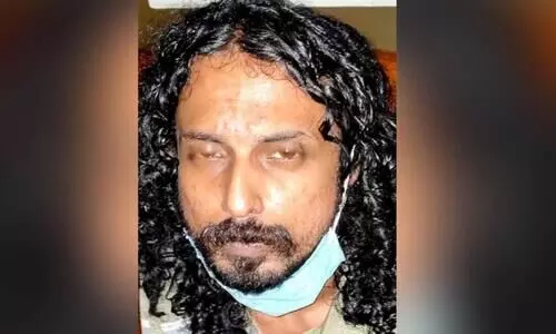 പി​താ​വി​നെ വെ​ട്ടി​പ്പ​രി​ക്കേ​ൽ​പി​ച്ചു