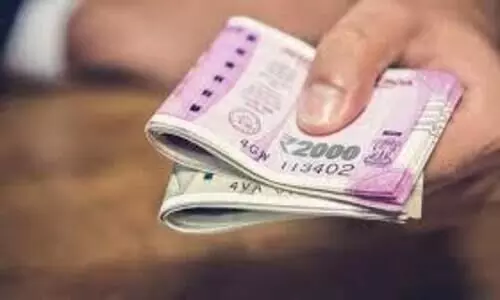 എ.ടി.എമ്മില്‍നിന്ന് കിട്ടിയ തുക ഉടമക്ക് നൽകി