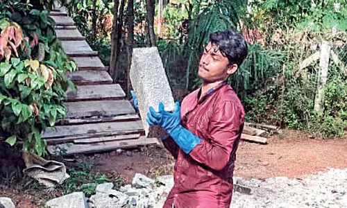 ശ്രീരാജ് ജോലിക്കിടെ