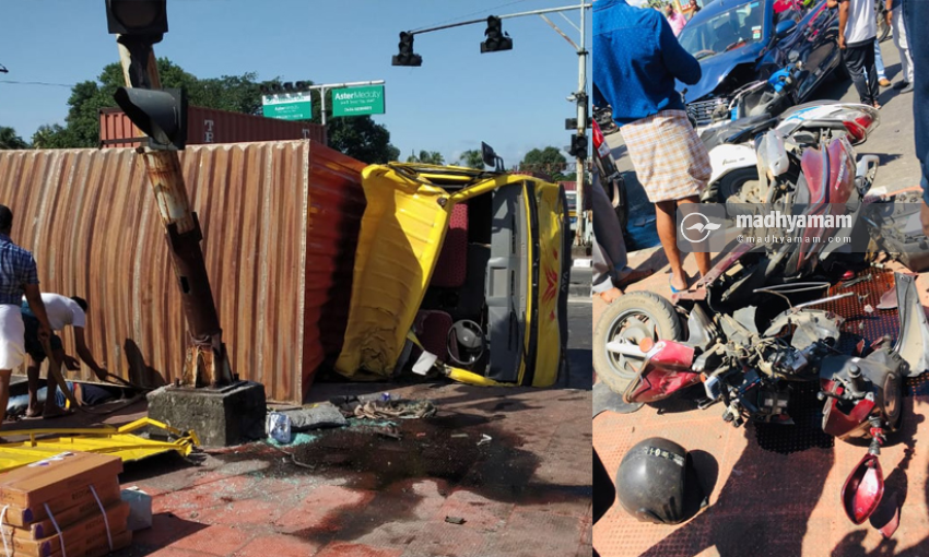 സിഗ്നലിലേക്ക് കണ്ടെയ്നർ ലോറി ഇടിച്ചുകയറി; നിരവധി വാഹനങ്ങൾ തകർന്നു, ഒരു മരണം സിഗ്നലിലേക്ക് കണ്ടെയ്നർ ലോറി ഇടിച്ചുകയറി; നിരവധി വാഹനങ്ങൾ തകർന്നു, ഒരു മരണം