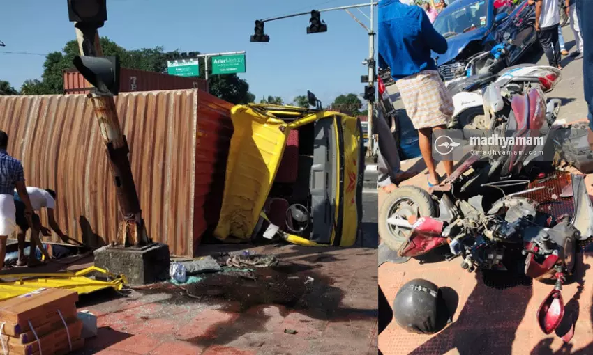 സിഗ്നലിലേക്ക് കണ്ടെയ്നർ ലോറി ഇടിച്ചുകയറി; നിരവധി വാഹനങ്ങൾ തകർന്നു, ഒരു മരണം സിഗ്നലിലേക്ക് കണ്ടെയ്നർ ലോറി ഇടിച്ചുകയറി; നിരവധി വാഹനങ്ങൾ തകർന്നു, ഒരു മരണം