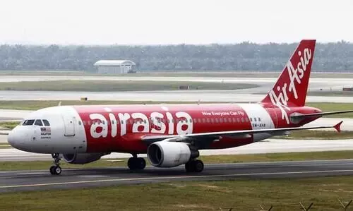 യാത്രക്കാരിൽ നിന്ന്​ ചെക് ഇന്‍ ഫീസ്​ ഈടാക്കാനൊരുങ്ങി എയര്‍ ഏഷ്യ