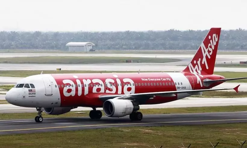 യാത്രക്കാരിൽ നിന്ന്​ ചെക് ഇന്‍ ഫീസ്​ ഈടാക്കാനൊരുങ്ങി എയര്‍ ഏഷ്യ