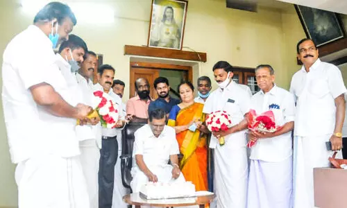 pj joseph cutting cake