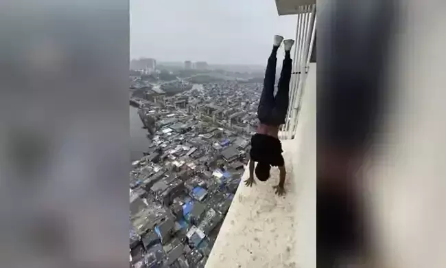 22ാം നിലയിൽ കൈകുത്തി നിന്ന്​ അഭ്യാസപ്രകടനം നടത്തിയയാൾ അറസ്​റ്റിൽ