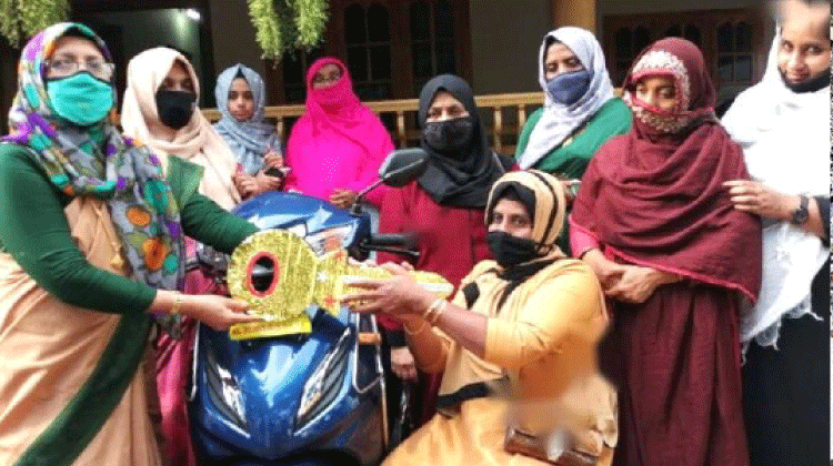റിയാദ് കെ.എം.സി.സി വനിതവിങ് മുച്ചക്ര വാഹനം നൽകി റിയാദ് കെ.എം.സി.സി വനിതവിങ് മുച്ചക്ര വാഹനം നൽകി