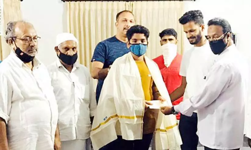 പൂനൂർ പുഴയിൽ മുങ്ങിത്താഴ്ന്ന യുവാവിന് പന്ത്രണ്ടുകാരനിലൂടെ പുനർജന്മം