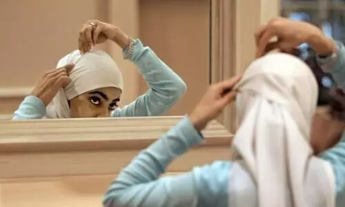 ഫോ​​ട്ടോ എ​ടു​ക്കാ​ൻ ശി​രോ​വ​സ്​​ത്രം അ​ഴി​ക്കേണ്ട– ന്യൂ​യോ​ർ​ക്​ പൊ​ലീ​സ്​