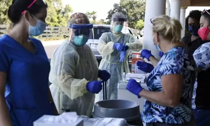 ഒറ്റ ദിവസം രോഗികൾ രണ്ട് ലക്ഷത്തോളം; യു.എസിൽ കോവിഡിന്റെ കുതിപ്പ് ഒറ്റ ദിവസം രോഗികൾ രണ്ട് ലക്ഷത്തോളം; യു.എസിൽ കോവിഡിന്റെ കുതിപ്പ്