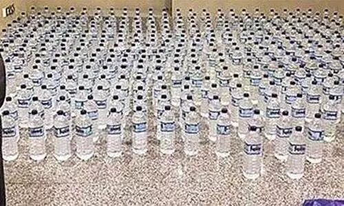 346 കു​പ്പി മ​ദ്യം പി​ടി​കൂ​ടി