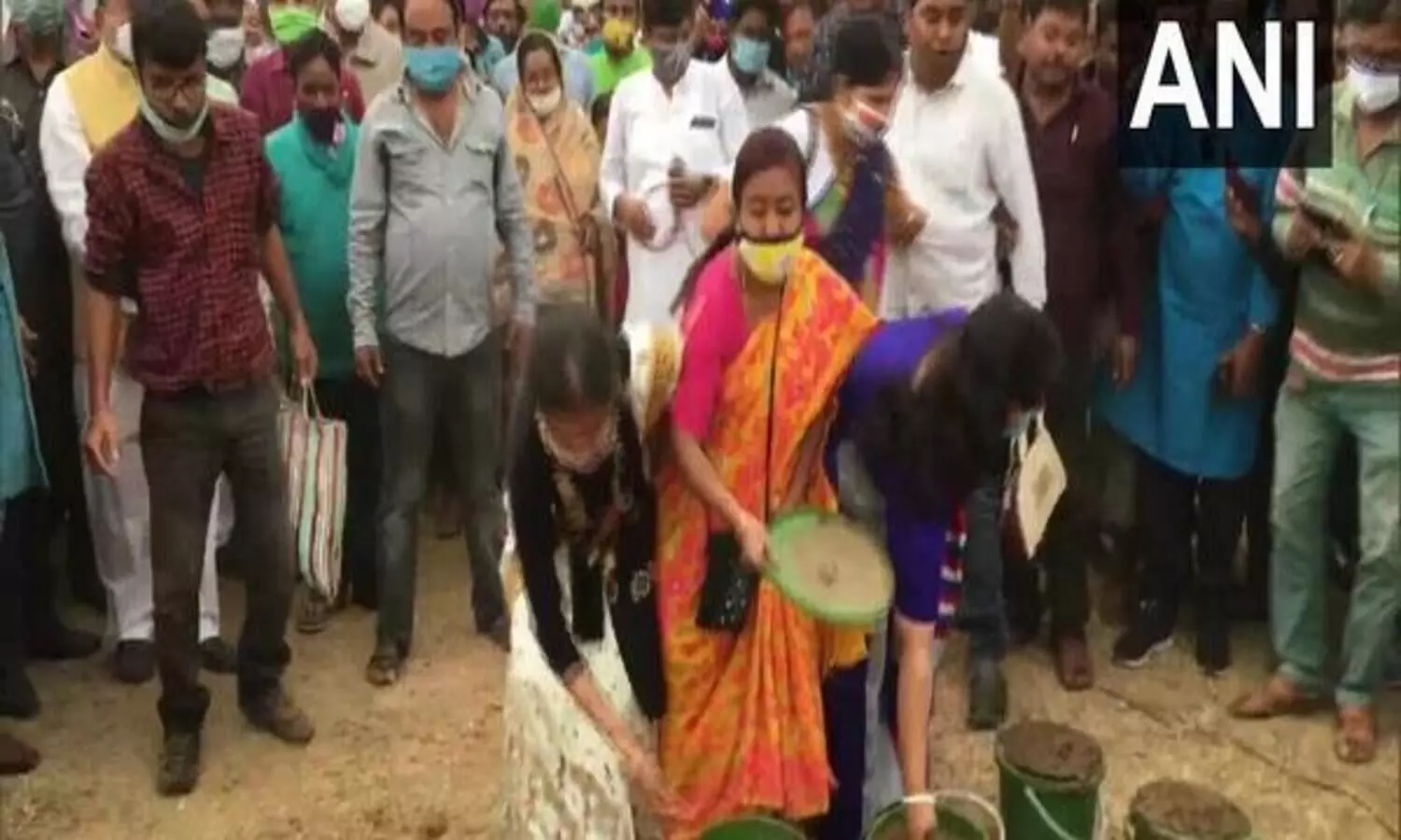 After BJPs rally, TMC workers sanitise field with cow dung in WBs Birbhum