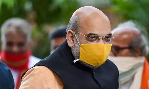 GHMC polls: Shah reaches Hyderabad for roadshow, offers prayers at Bhagyalakshmi Temple