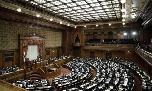 japan parliment paases bill to provide free covid vaccine
