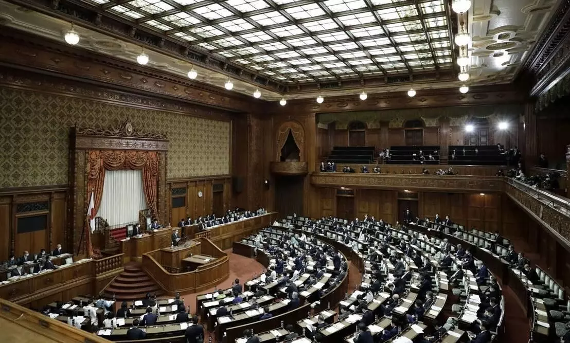 japan parliment paases bill to provide free covid vaccine