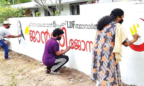 സ്ഥാ​നാ​ർ​ഥി ഭാ​ര്യ; മ​തി​ലെ​ഴു​ത്തു​മാ​യി ബ​ഹ്​​റൈ​ൻ പ്ര​വാ​സി