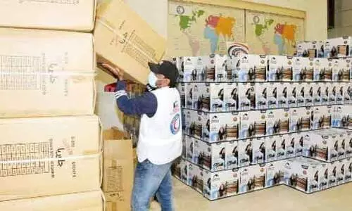 550 കു​ടും​ബ​ത്തി​ന്​ സ​ഹാ​യ​വി​ത​ര​ണ​വു​മാ​യി റെ​ഡ്​ ക്രെ​സ​ൻ​റ്​ സൊ​സൈ​റ്റി