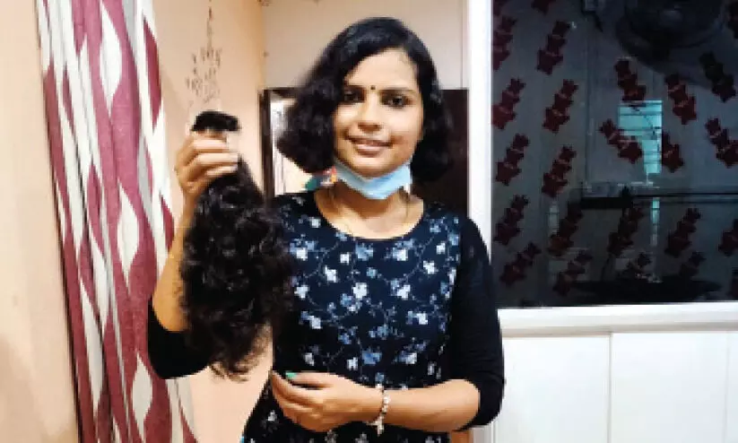 അർബുദ രോഗികള്‍ക്കായി മുടി മുറിച്ച്​ ശ്രുതിയുടെ പിറന്നാള്‍ ആഘോഷം