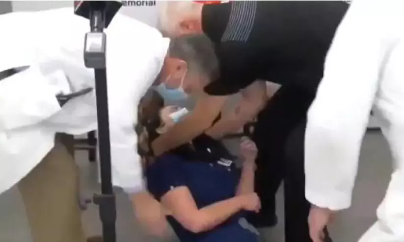 US nurse faints after getting Pfizer coronavirus vaccine shot