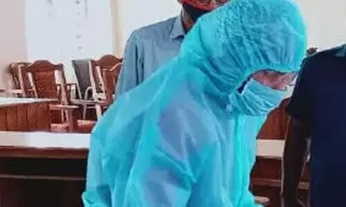 Two were sworn in wearing PPE kits