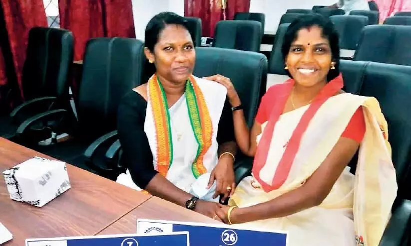 Usha and Jinsha at the Council Hall for oath