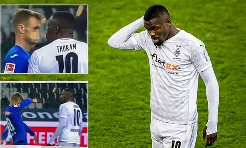 Marcus Thuram was sent off for spitting at an opponent
