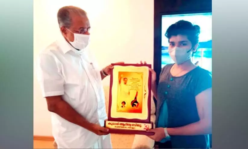 pinarayi vijayan with adithya pinarayi vijayan with adithya