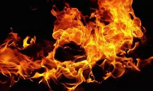 BJP activists bike fired BJP activists bike fired