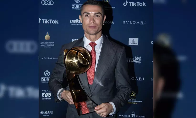 Cristiano ronaldo with Soccer Player Of The Century Award