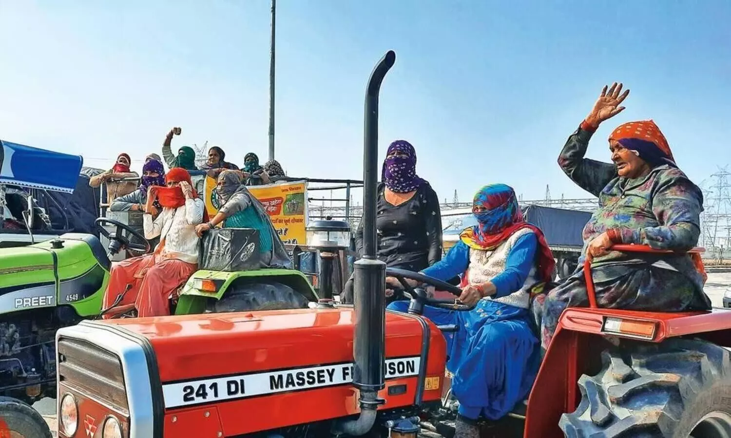 women in tractor