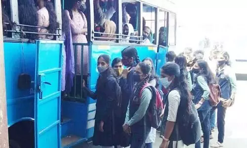 students waiting to get in to bus students waiting to get in to bus