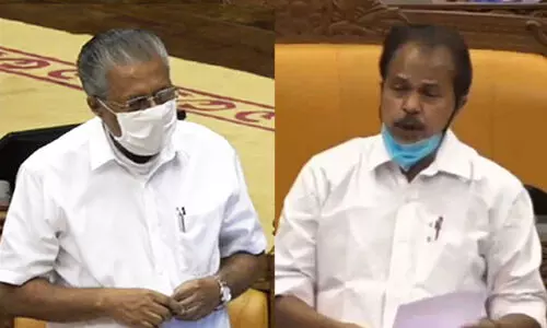 pinarayi vijayan-pt thomas