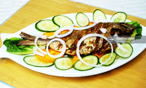 Puliyalayittu Pollicha Meen