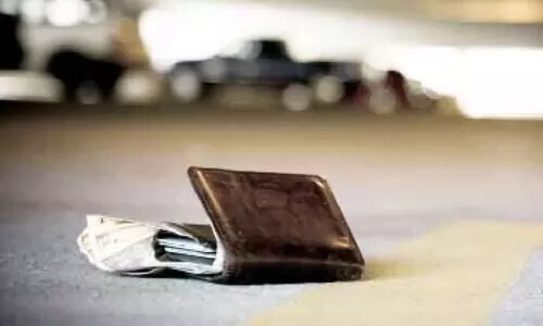 purse was handed over to the owner