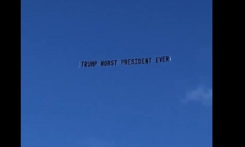 വൈറ്റ്​ഹൗസ്​ വിട്ടിട്ടും ട്രംപിനെ വിടാതെ ജനം; വീടിനു മുകളിൽ പറന്ന്​ ഏറ്റവും ​മോശം പ്രസിഡ​ൻറ്​ ബാനർ