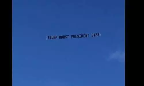 വൈറ്റ്​ഹൗസ്​ വിട്ടിട്ടും ട്രംപിനെ വിടാതെ ജനം; വീടിനു മുകളിൽ പറന്ന്​ ഏറ്റവും ​മോശം പ്രസിഡ​ൻറ്​ ബാനർ