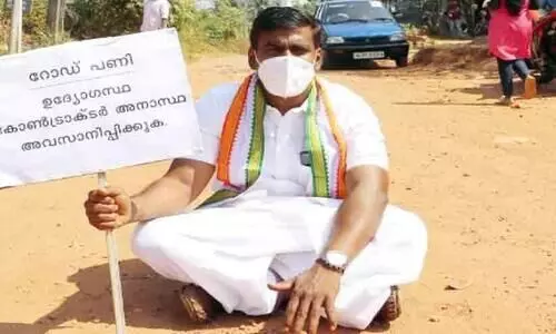 Road construction halfway; councilor in protest