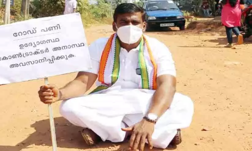 Road construction halfway; councilor in protest