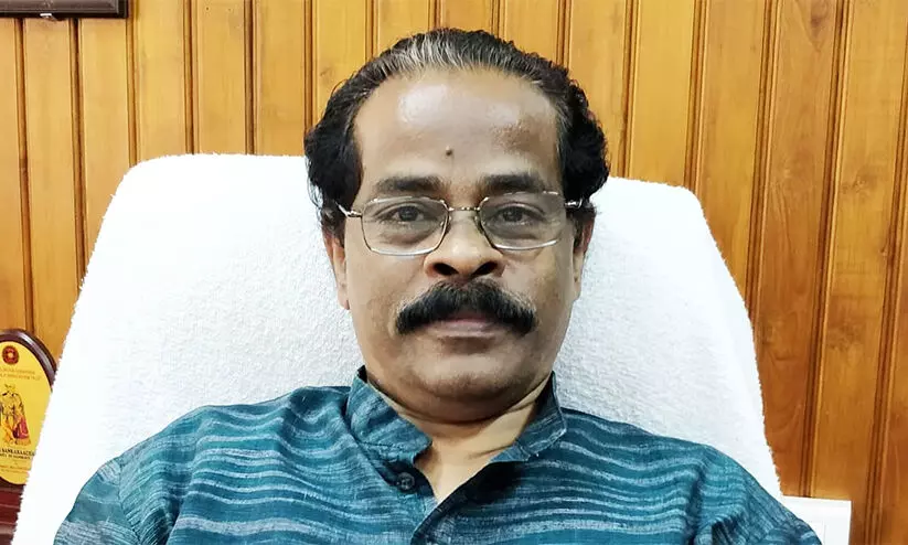 dr dharmaraj adat