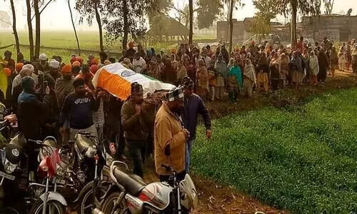 Family booked for draping body