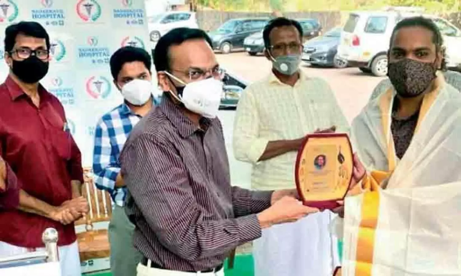 Honored the young man who delivered hair to cancer patients