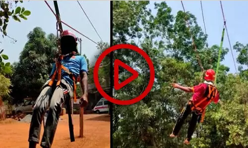 പ്രളയ ബാധിതരെ കയറിൽ തൂങ്ങി രക്ഷിക്കാൻ ഫയർഫോഴ്​സ്​