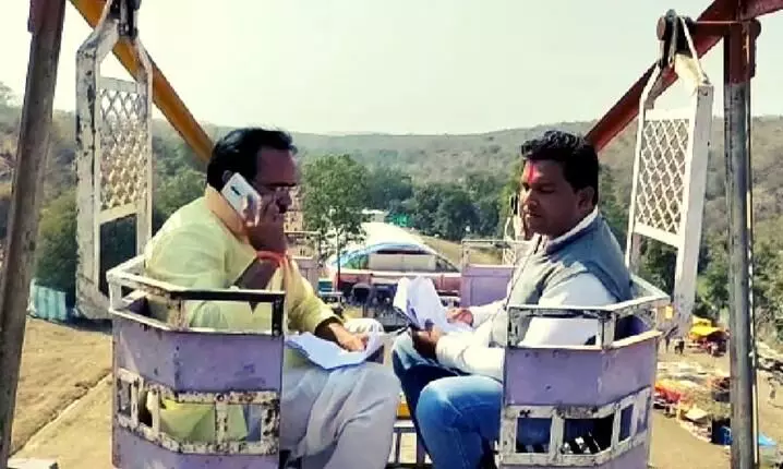 Madhya Pradesh minister climbs atop