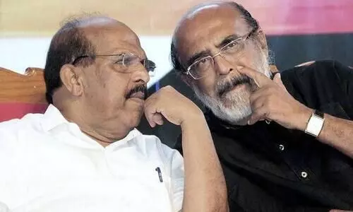 g sudhakaran and thomas issac