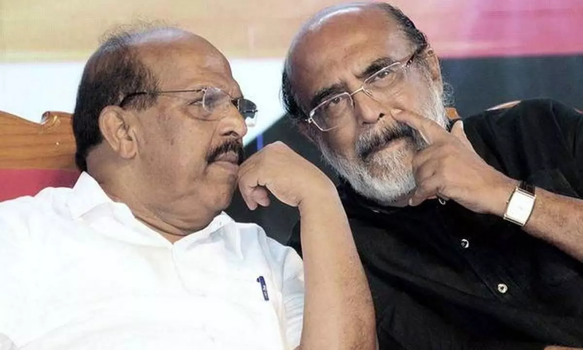 g sudhakaran and thomas issac