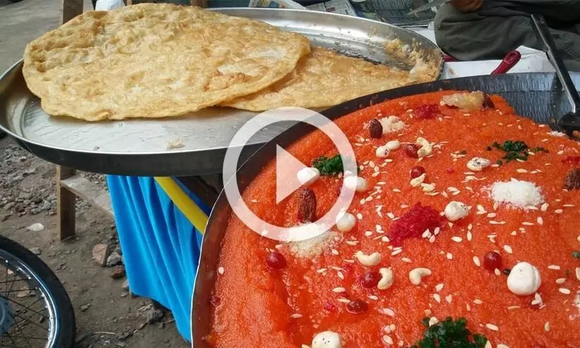 മുറംപോലെ പരത്തി നെയ്യിൽ പൊരിച്ചെടുക്കുന്ന ഭീമൻ ഹൽവ പൊറോട്ട -വൈറൽ വിഡിയോ