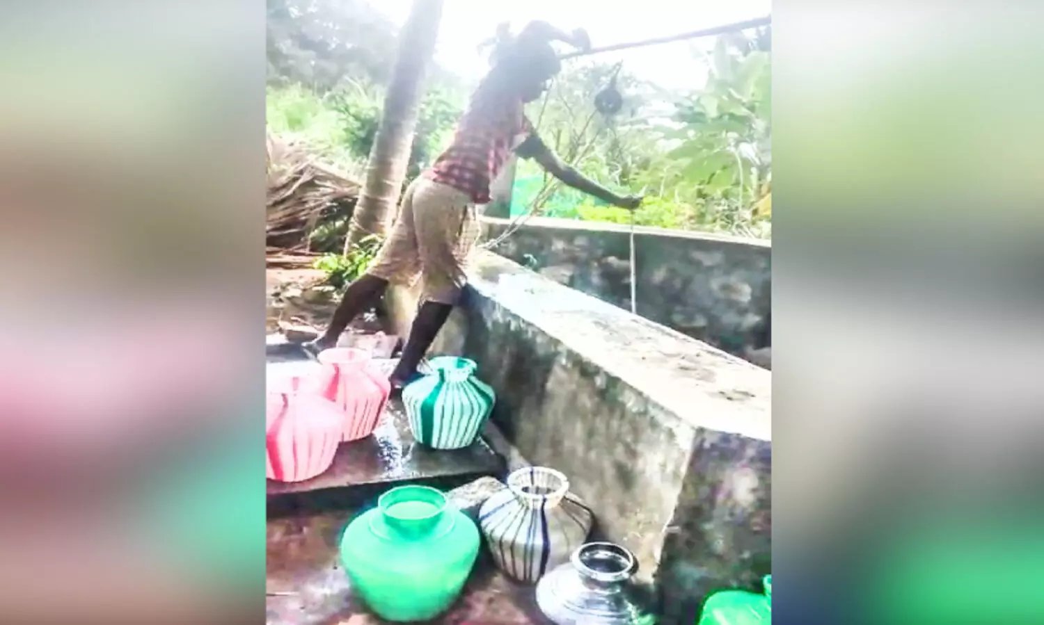 boy collecting water